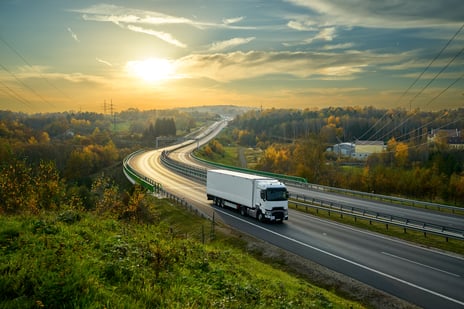EV100+ truck on road