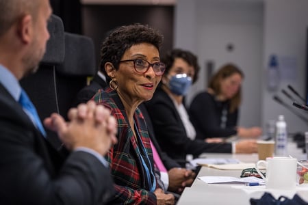 Woman speaking at roundtable