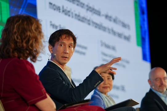 Spencer low speaking on stage