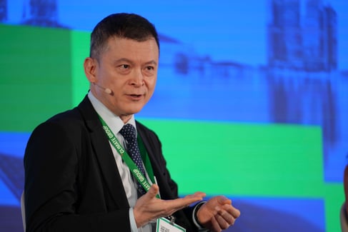 Speaker on stage at the Summit