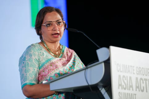 Speaker on stage at the Summit