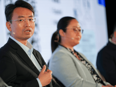 Speakers in panel on stage