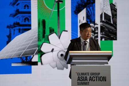 Jacob Li speaking on stage